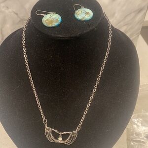 Elegant Blue Earrings and chain with hands